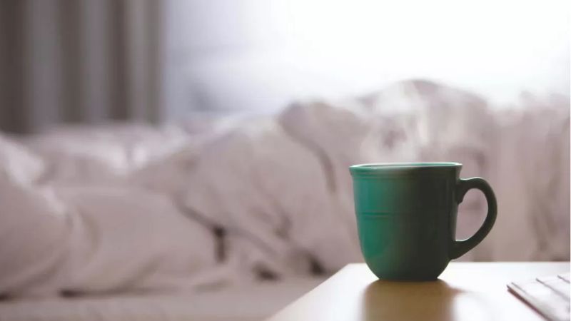 Person resting in bed to illustrate the link between ADHD and sleep challenges